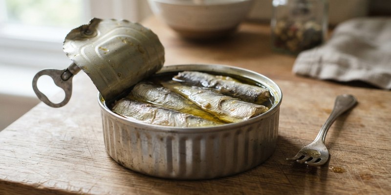 opening tin of fish